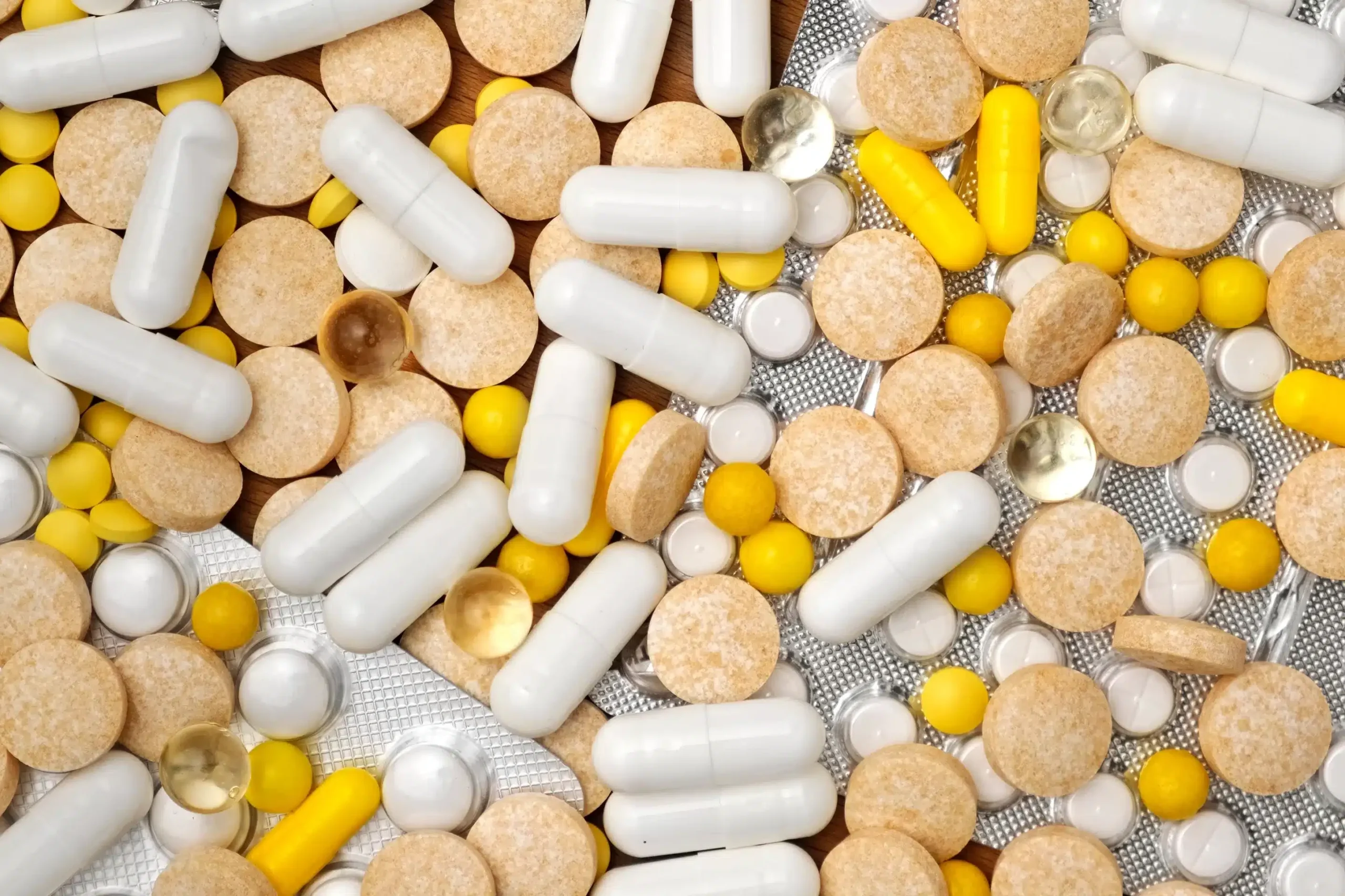 a pile of pills and tablets
