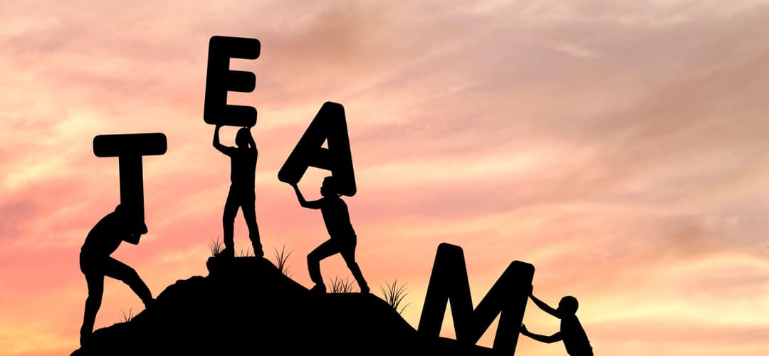 Clinicians working together to spell the word team Clinicians working together to spell the word team